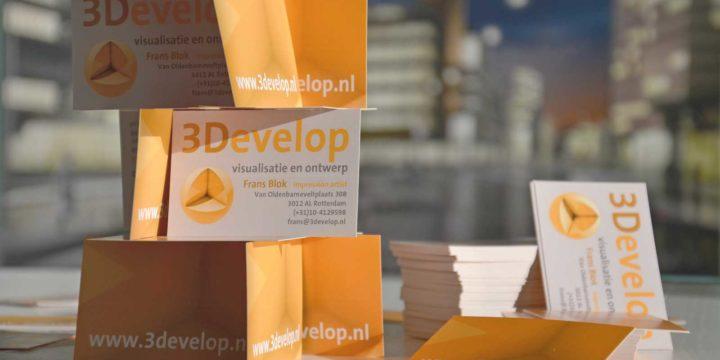 Kaartenhuis gebouwd van visitekaartjes van 3Develop met de door het bedrijf gemaakte visualisatie van Dudok's Bijenkorf vaag op de achtergrond