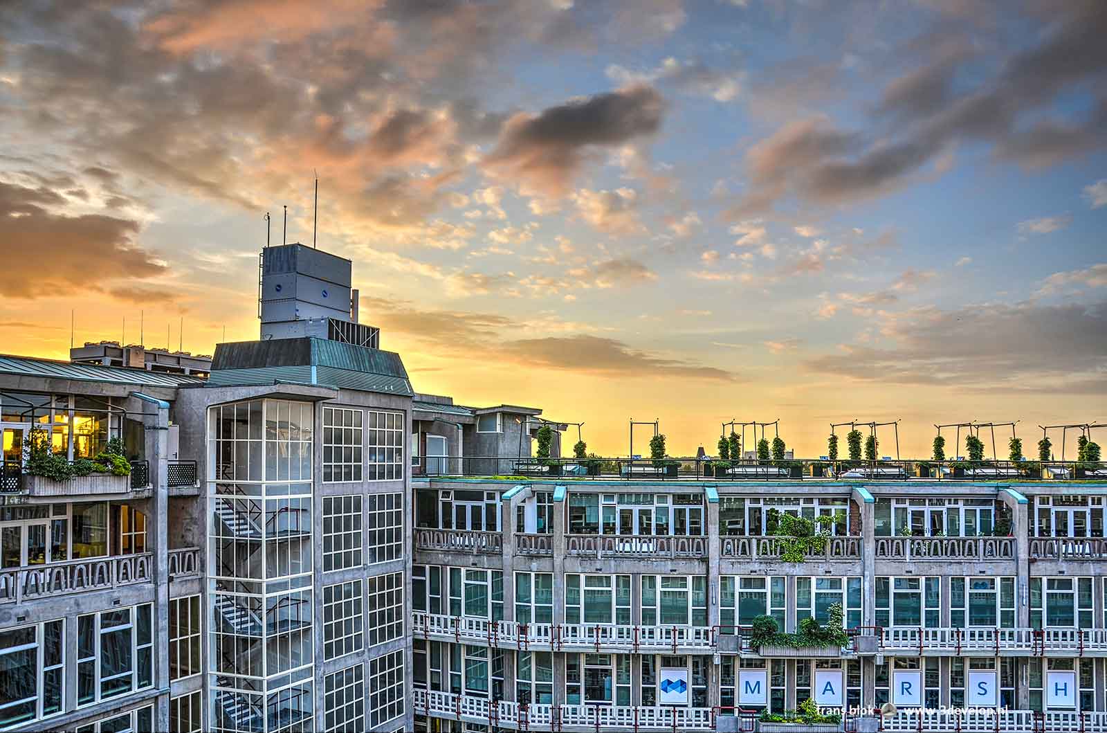 One of the courtyards of Maaskant's Groothandelsgebouw in Rotterdam during sunset