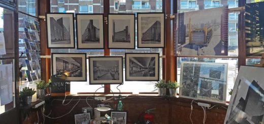 Interior photo of the bridge keepers cabin of the Orange Bridge in Schiedam, during the Dudok exhibition with photos and drawings of Dudok's Rotterdam Bijenkorf