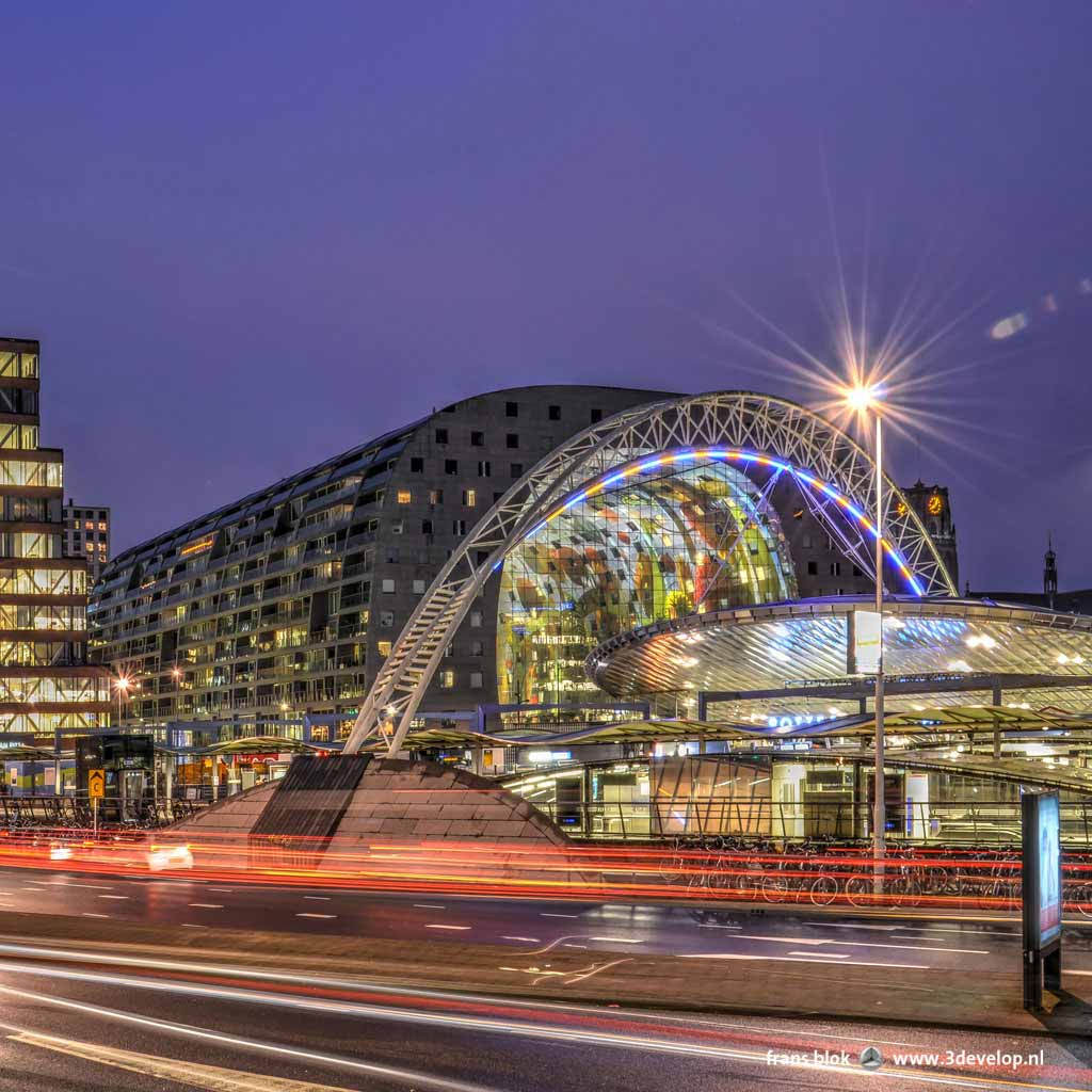 Photo made during the morning rush hour just before sunrise at Blaak in Rotterdam, fearuring the metro and train station as well as the Markthal