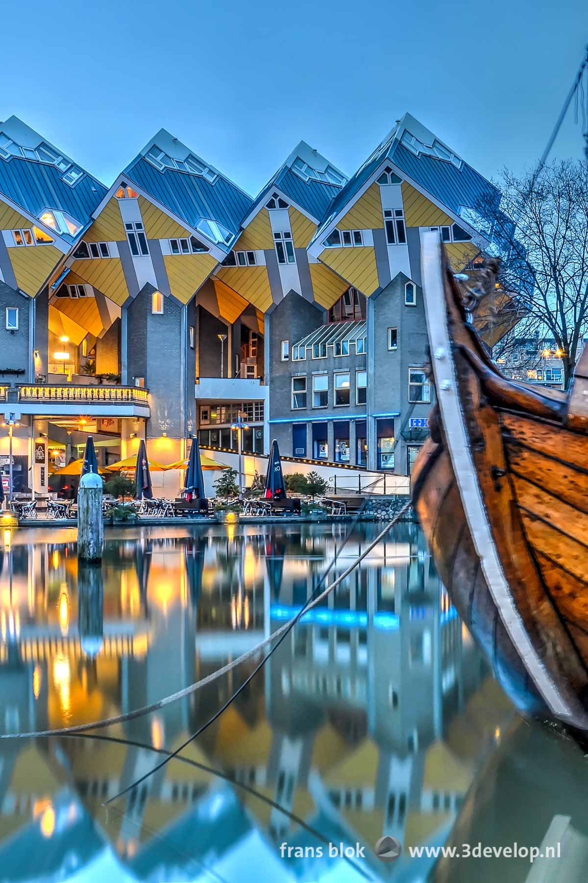 Popular on Pinterest: a photo made at dusk of the Cube houses reflecting in the Old Harbour in Rotterdam