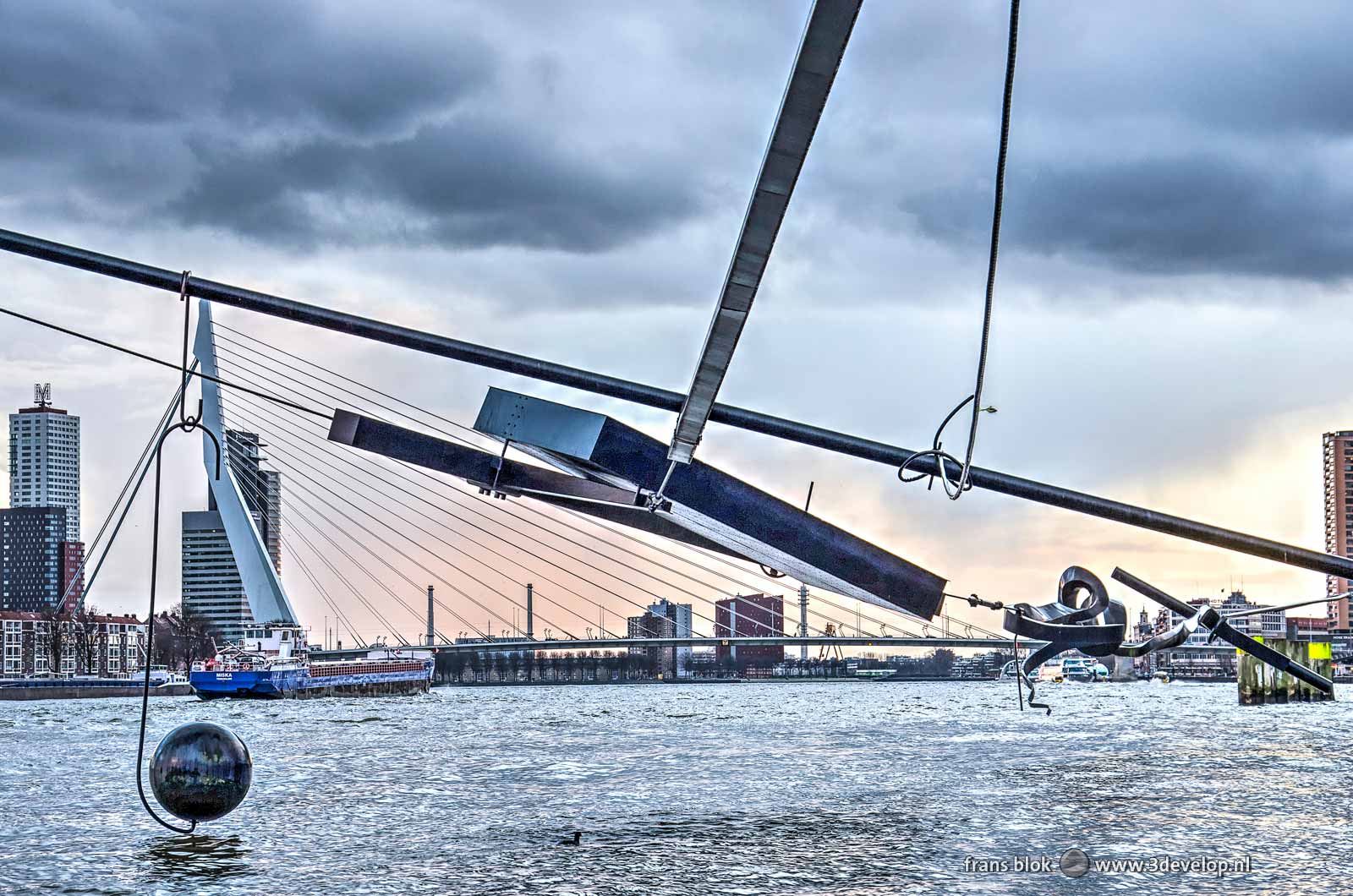 Sculpture Maasbeeld/The Washing Line by Auke de Vries above the river Nieuwe Maas with Erasmusbridge in the background