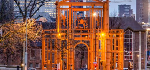 The giant steel sculpture The New Delft Gate by artist Cor Kraat on the corner of Pompenburg aan Haagseveer in Rotterdam