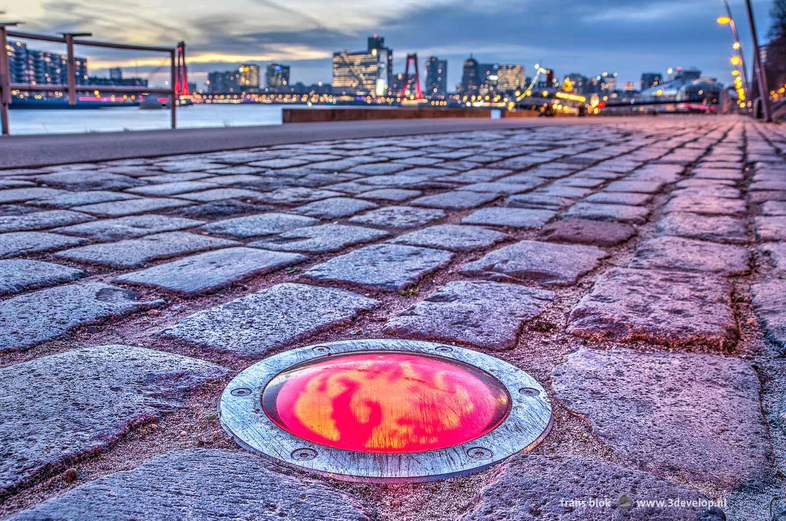 One of the hundreds of little lights in the pavement marking the Fire Limit in Rotterdam, the line around the area that was destroyed as a result of the May 14, 1940 bombing