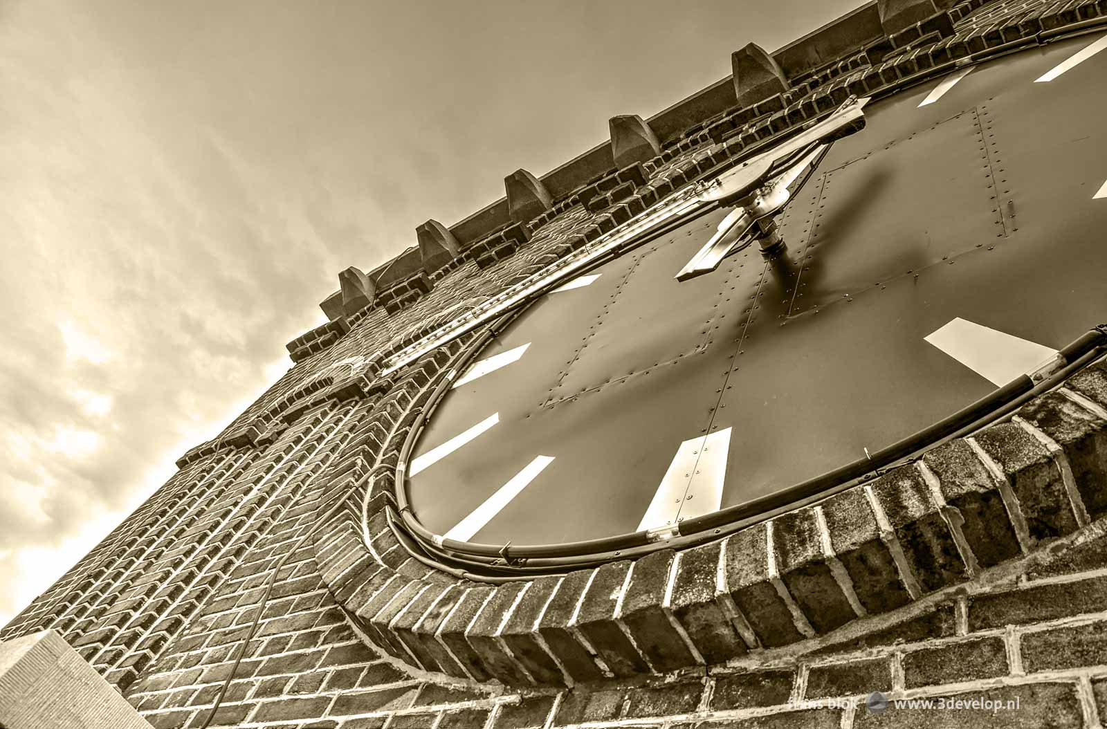 De clock of the Saint Lawrence and Elisabeth Cathedral on Mathenesserlaan in Rotterdam, seen close-up and from below