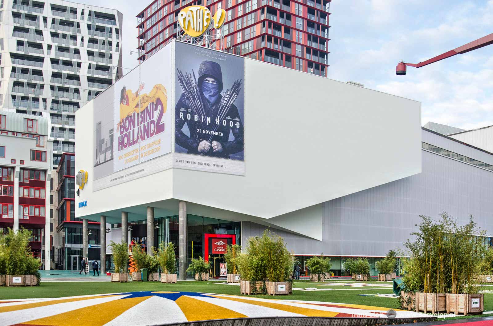 Photo of the Schouwburgplein in Rotterdam, shortly after the completion of the renovation of the Pathé cinema, with film posters of Robin Hood and Bonbini Holland on top of the skyline image