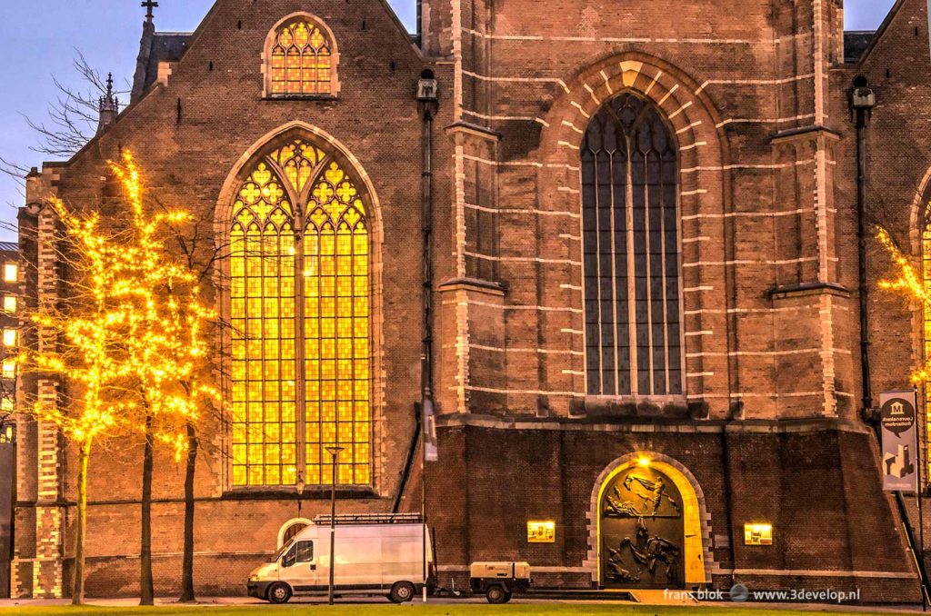 Photograph taken in the early morning of Saint Lawrence Church in Rotterdam, with a disfiguring white van parked in front of it