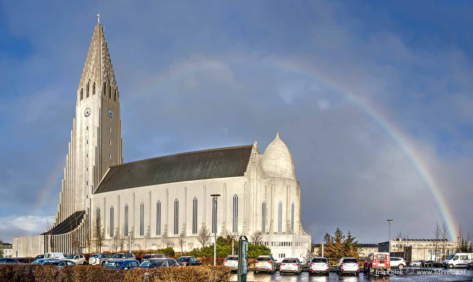 A rainbow behind Hallgrimskirkja, the iconic church in downtown Reykjavik, Iceland