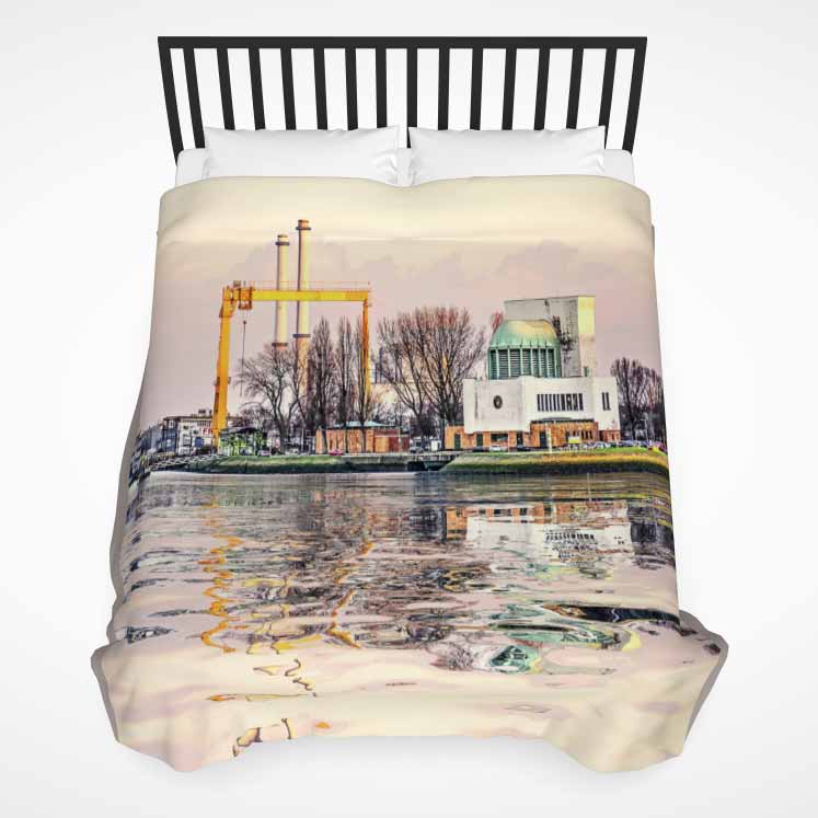 Duvet cover with a print of a surrealistic image of the Maastunnel ventilation building in Rotterdam reflecting in the river Nieuwe Maas at sunset