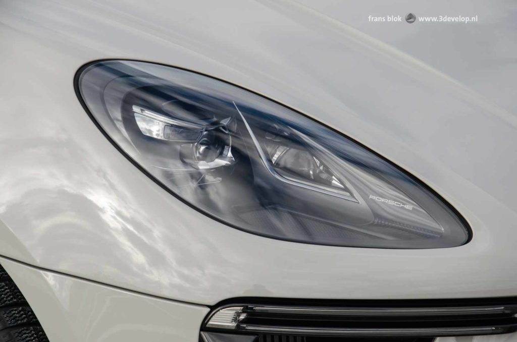 Beautifully designed headlights of a Porsche Macan Turbo