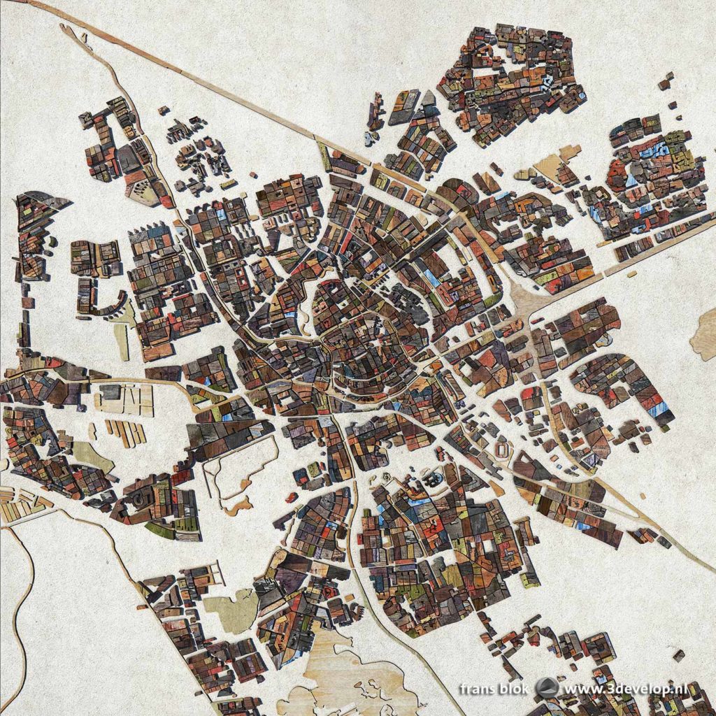 A map of the city of Groningen, the Netherlands, with city blocks and canals rendered as digital scrapwood and plywood