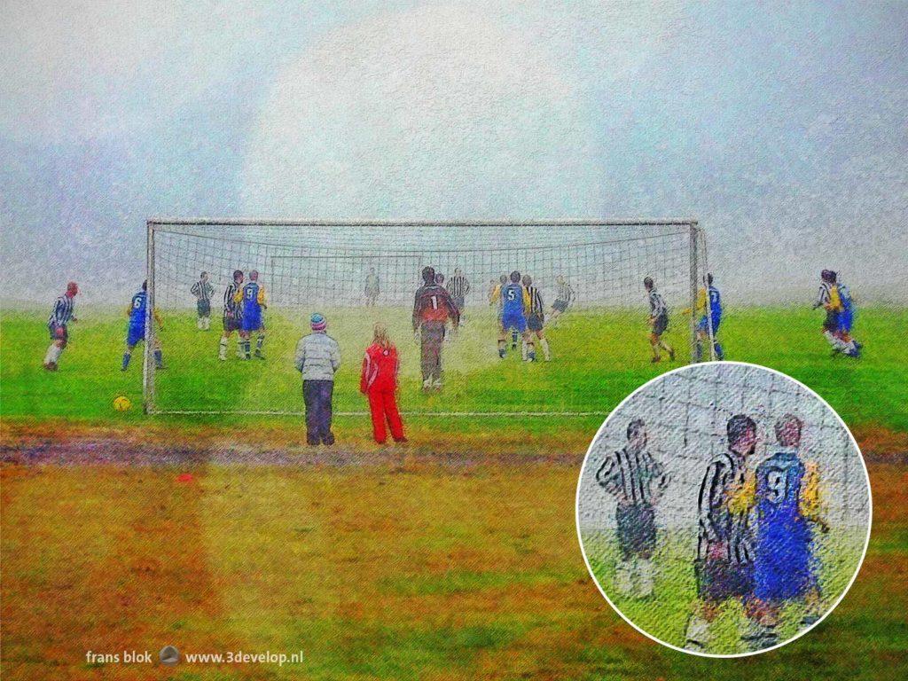 Picturesque impression of a football/soccer match on a misty day in Djupivogur, Iceland