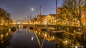 Photo of Aelbrechtskolk canal in Delfshaven, Rotterdam, The Netherlands, in the blue hour after sunset