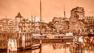 Monochrome photograph in sepia of the Old Harbour and the cube houses in Rotterdam, The Netherlands