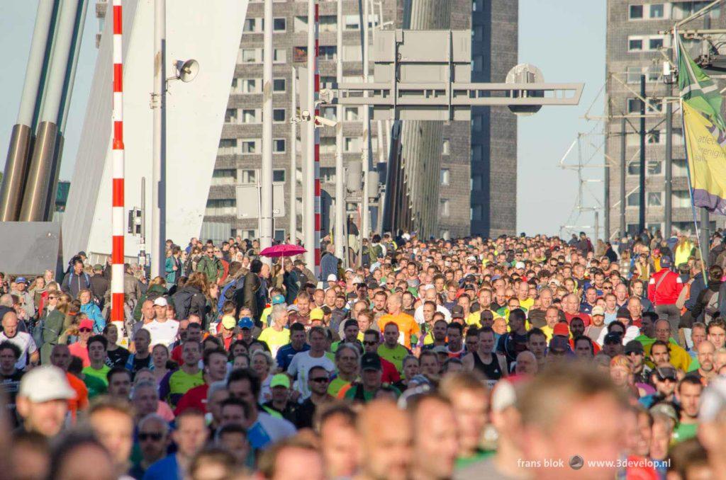 Hundreds of marathon runners on Erasmus Bridge in Rotterdam shortly after the start of the 2021 edition of the marathon