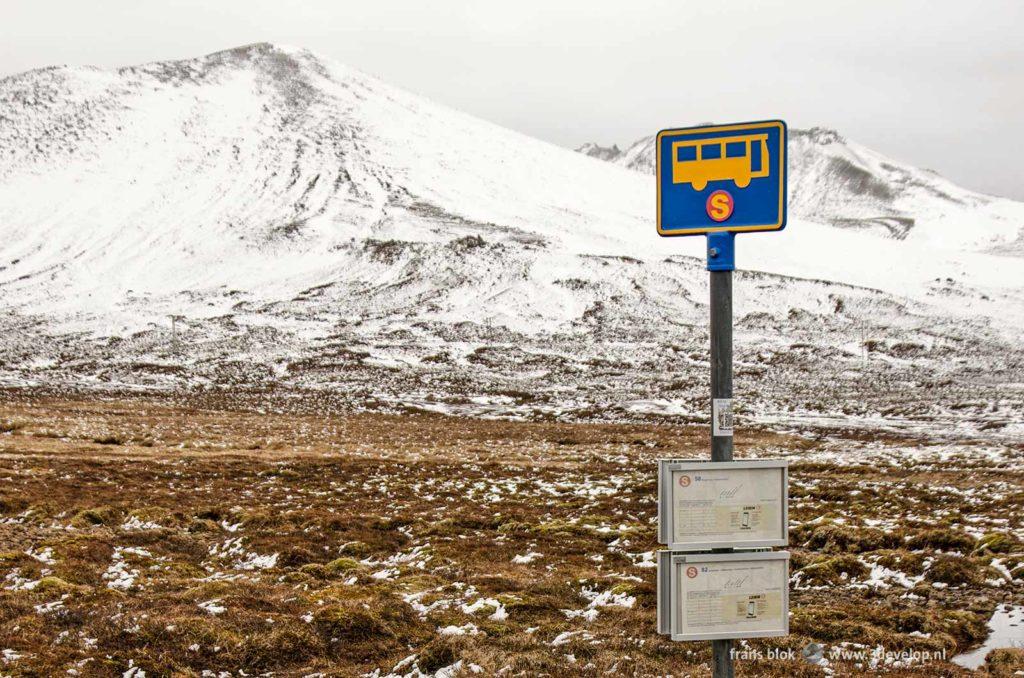 Straeto bus stop in a snowy mountain landscape near Stykkisholmur, Iceland