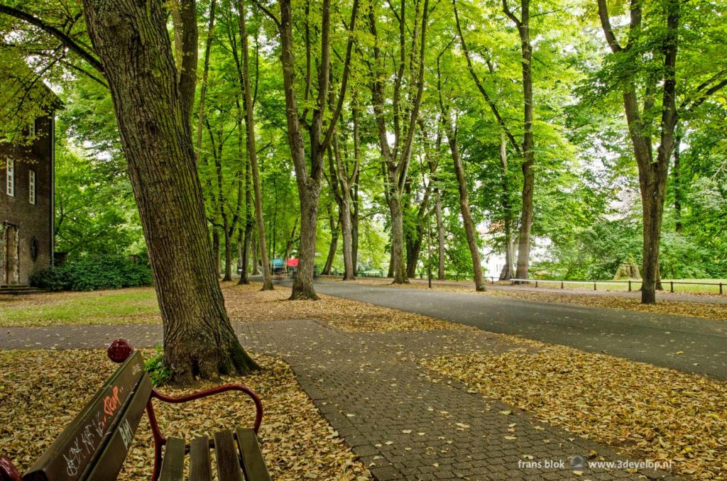 Park bench along the footpath on the Promenade in Münster, Germany