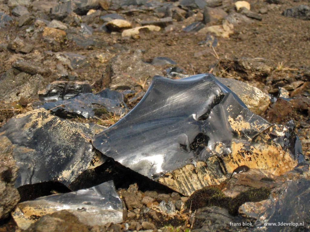 Shiny black obsidian rocks near Hraftinusker in Iceland