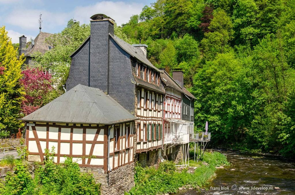 Traditional half-timbered houses in Monschau, Germany on a sunny day in spring