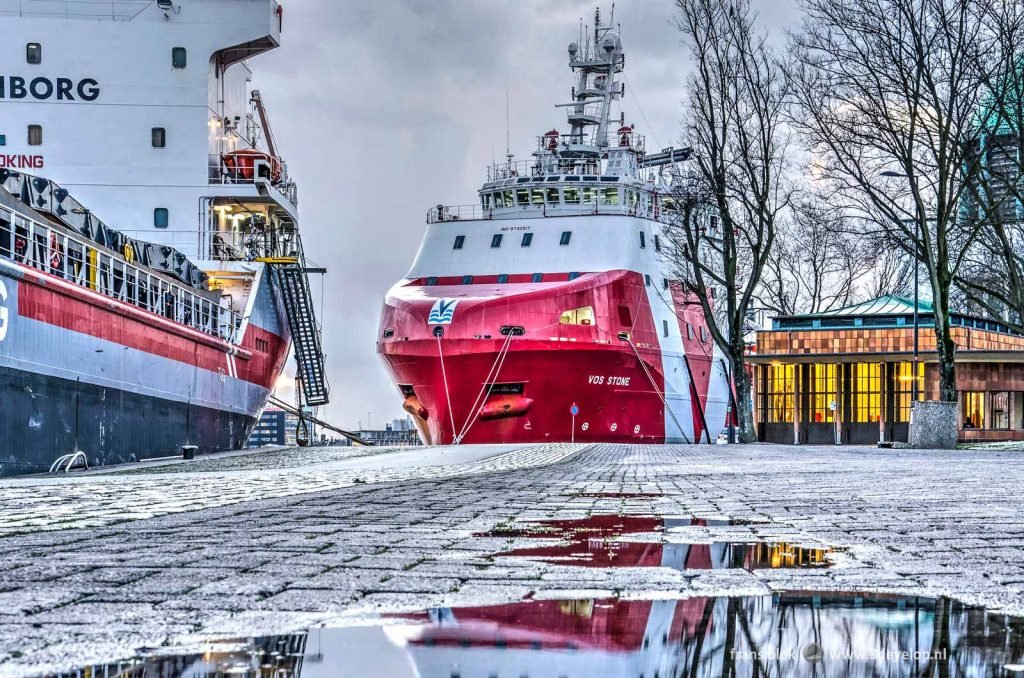 Large vessels moored at Park Quay in Rotterdam, next to the pedestrian and cyclists entrance to Maas tunnel