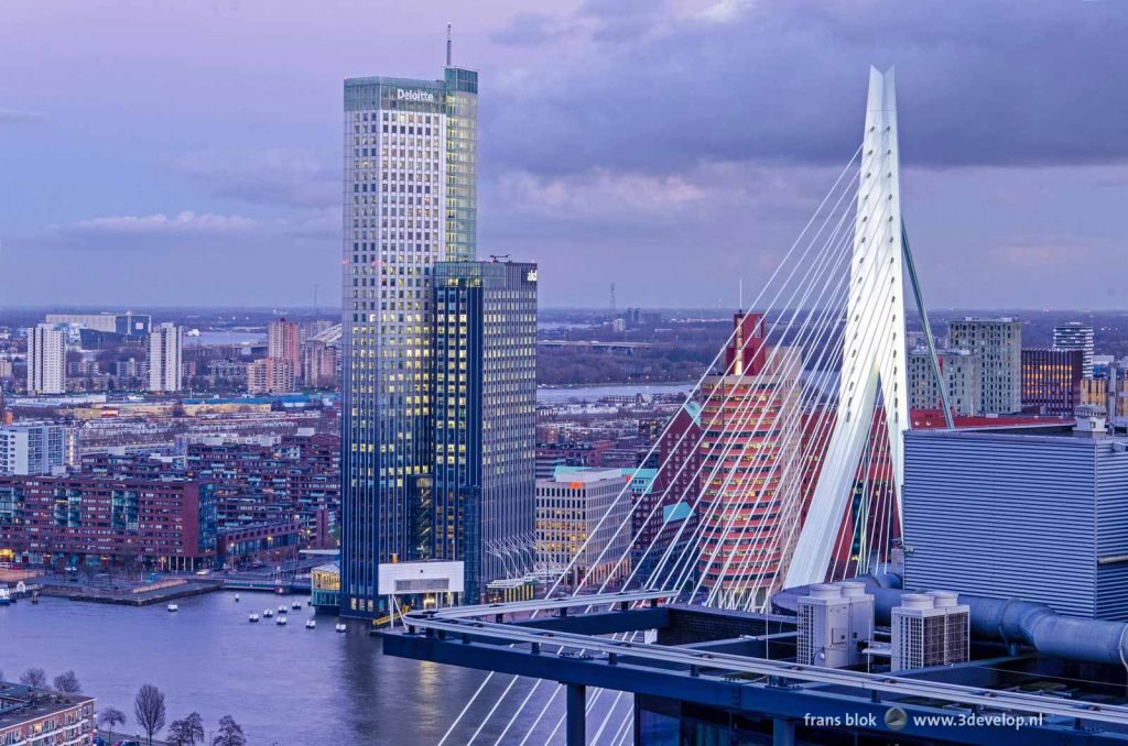 Maas tower and Erasmus bridge in Rotterdam, partly hidden by the penthouse in the Hoge Erasmus residential tower