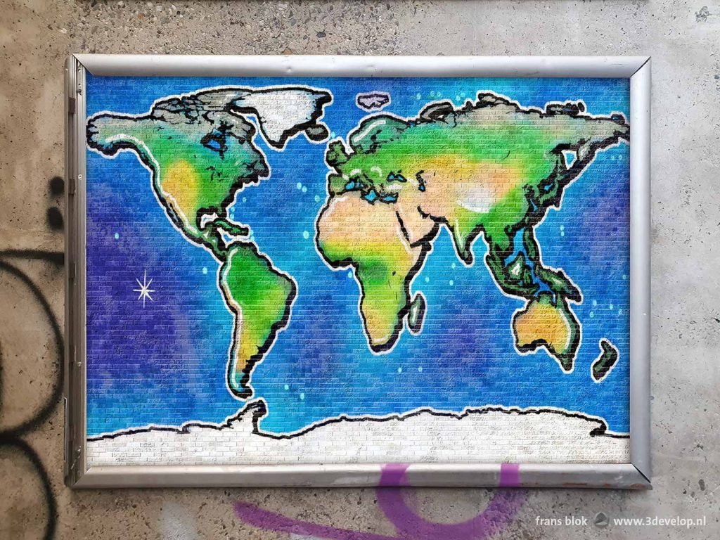 Framed print of a street art / graffiti world map in an urban environment