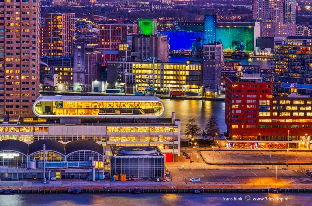 Colorful image of Rijn and Maashaven harbours and surroundings in Rotterdam in the blue hour after sunset