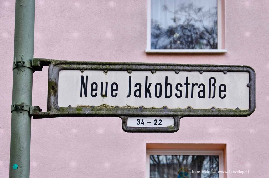 Street name sign of Neue Jacobstrasse in Berlin