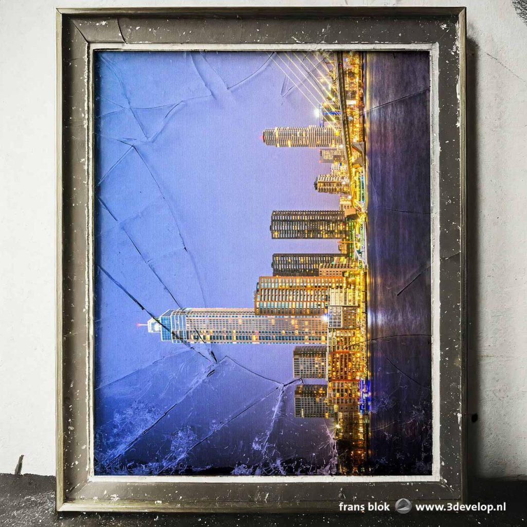 Photo of Zalmhaven tower and vicinity in Rotterdam during the blue hour, in an old frame with broken glass