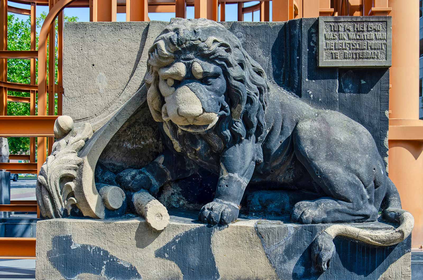 Stone sculpture of a lion on Delft Gate in Rotterdam